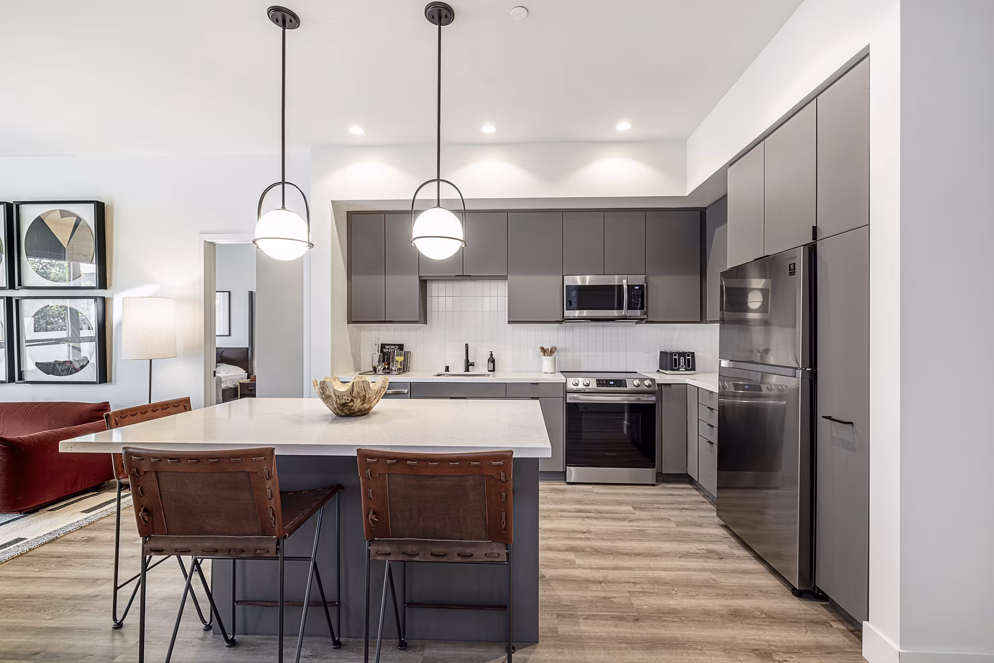 Modern kitchen with stainless steel appliances at Hollywood Park Apartments