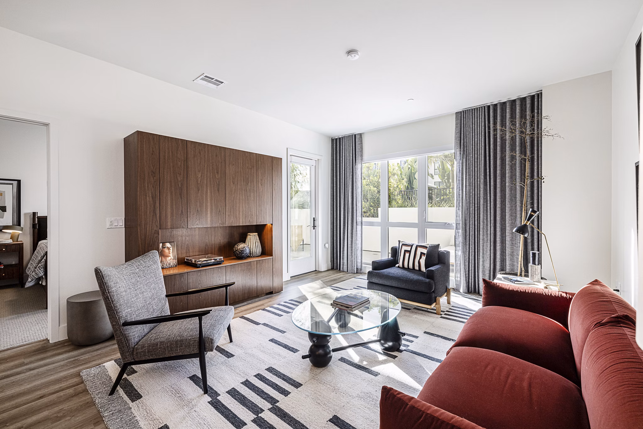 Hollywood Park Apartments: Modern living room with stylish decor and natural light