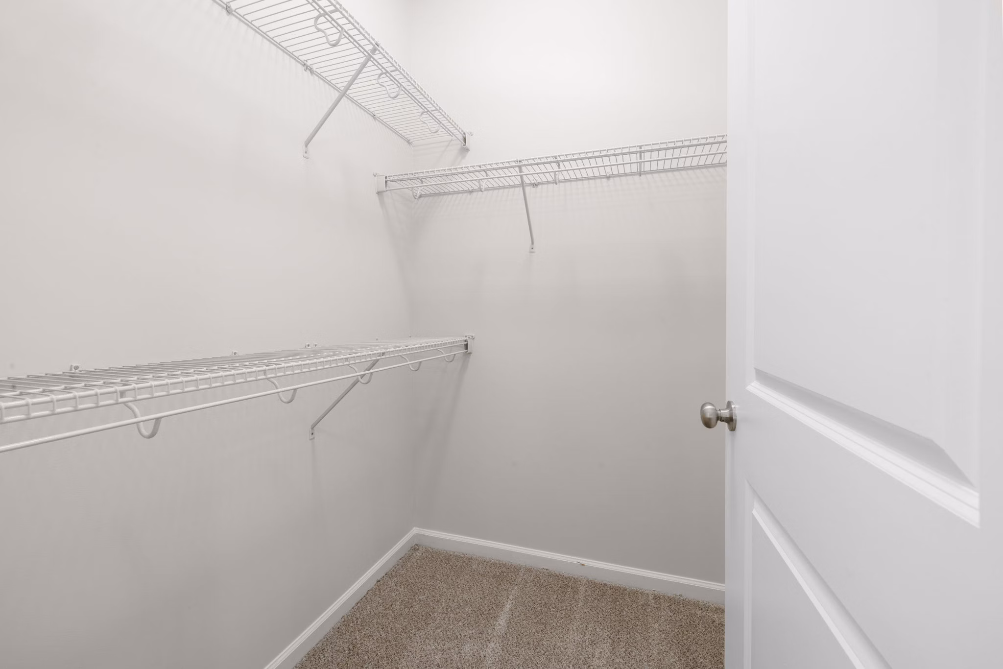 Spacious closet with ample shelving and storage space in Legacy at Wakefield Apartments' luxurious bedroom