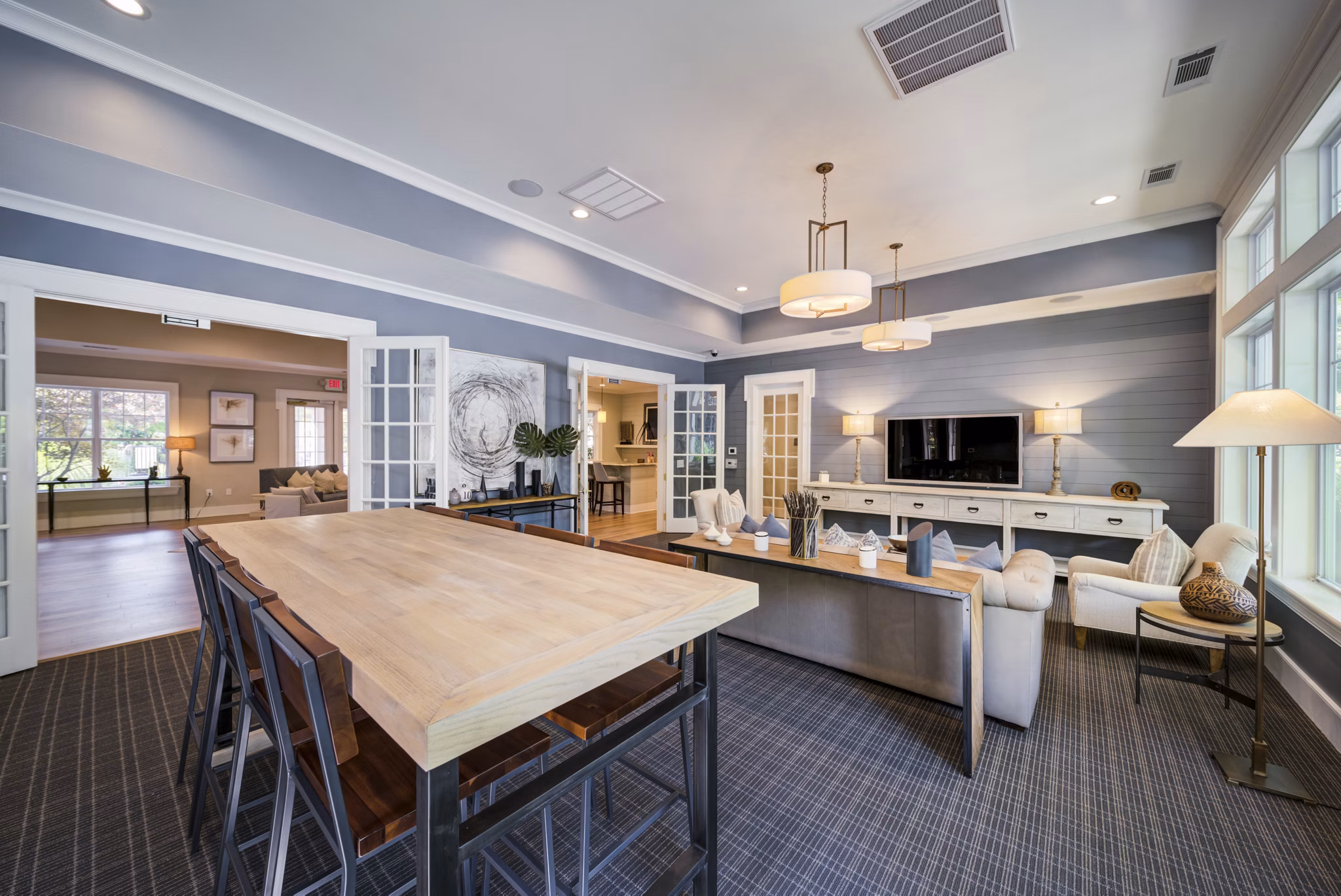Elegant clubhouse with modern seating and fireplace at Legacy at Wakefield Apartments