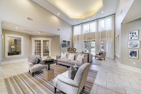 Clubhouse featuring lounge seating and modern decor at Legacy at Wakefield Apartments
