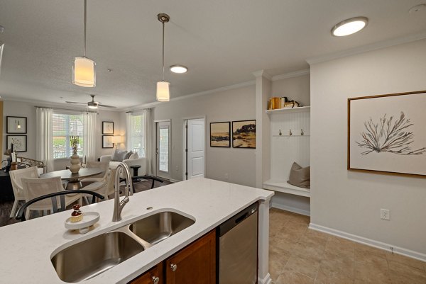 Modern kitchen featuring stainless steel appliances in Legacy at Wakefield Apartments