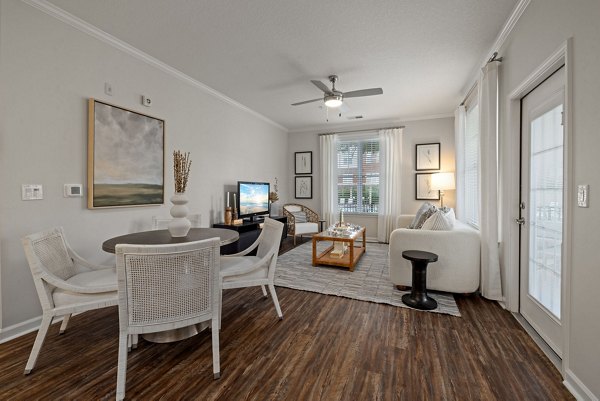 Spacious living room with modern decor in Legacy at Wakefield Apartments