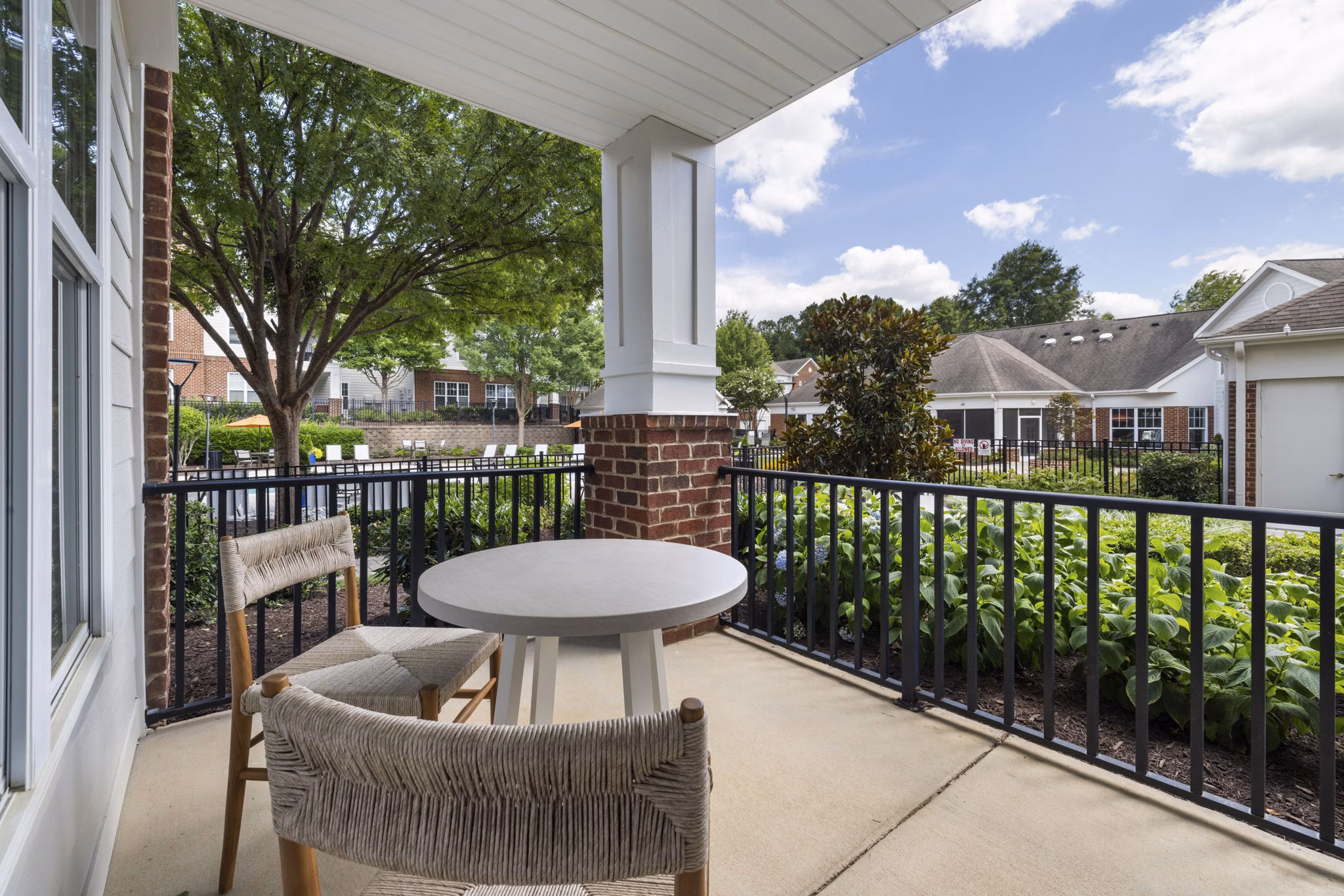 Balcony view showcasing outdoor relaxation space at Legacy at Wakefield Apartments