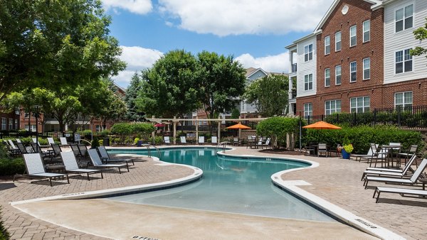 Relaxing poolside view at Legacy at Wakefield Apartments, a luxury community offering premium amenities for residents