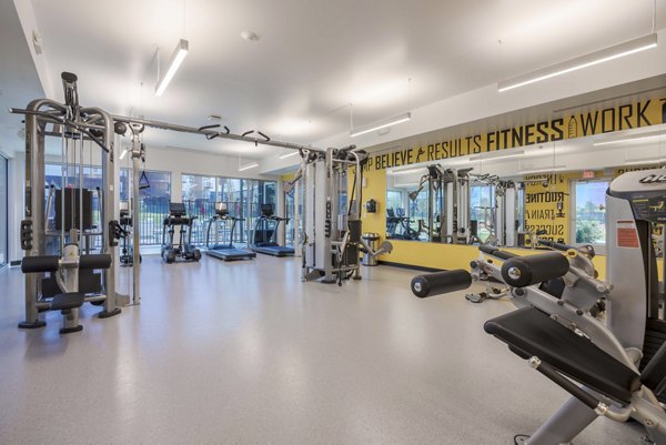 fitness center at FLATZ 512 Apartments