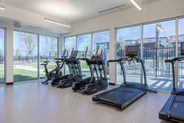 fitness center at FLATZ 512 Apartments