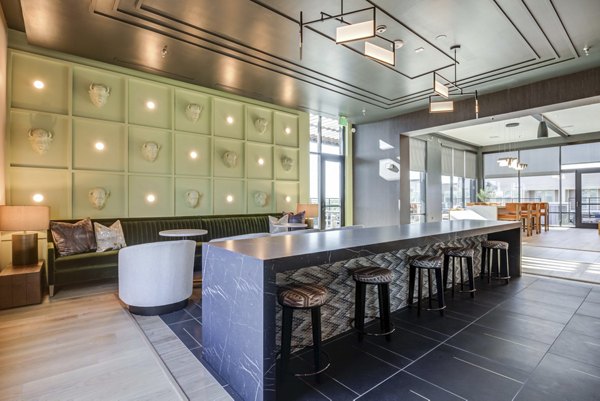 Elegant clubhouse with modern design at NOMA Apartments offering luxury amenities and social spaces