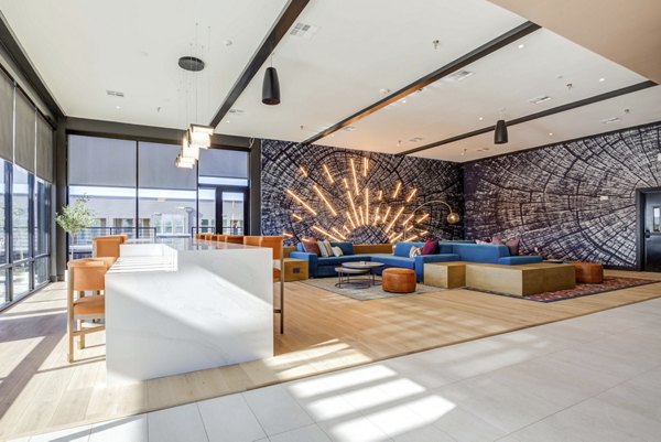 Clubhouse featuring modern design and comfortable seating at NOMA Apartments