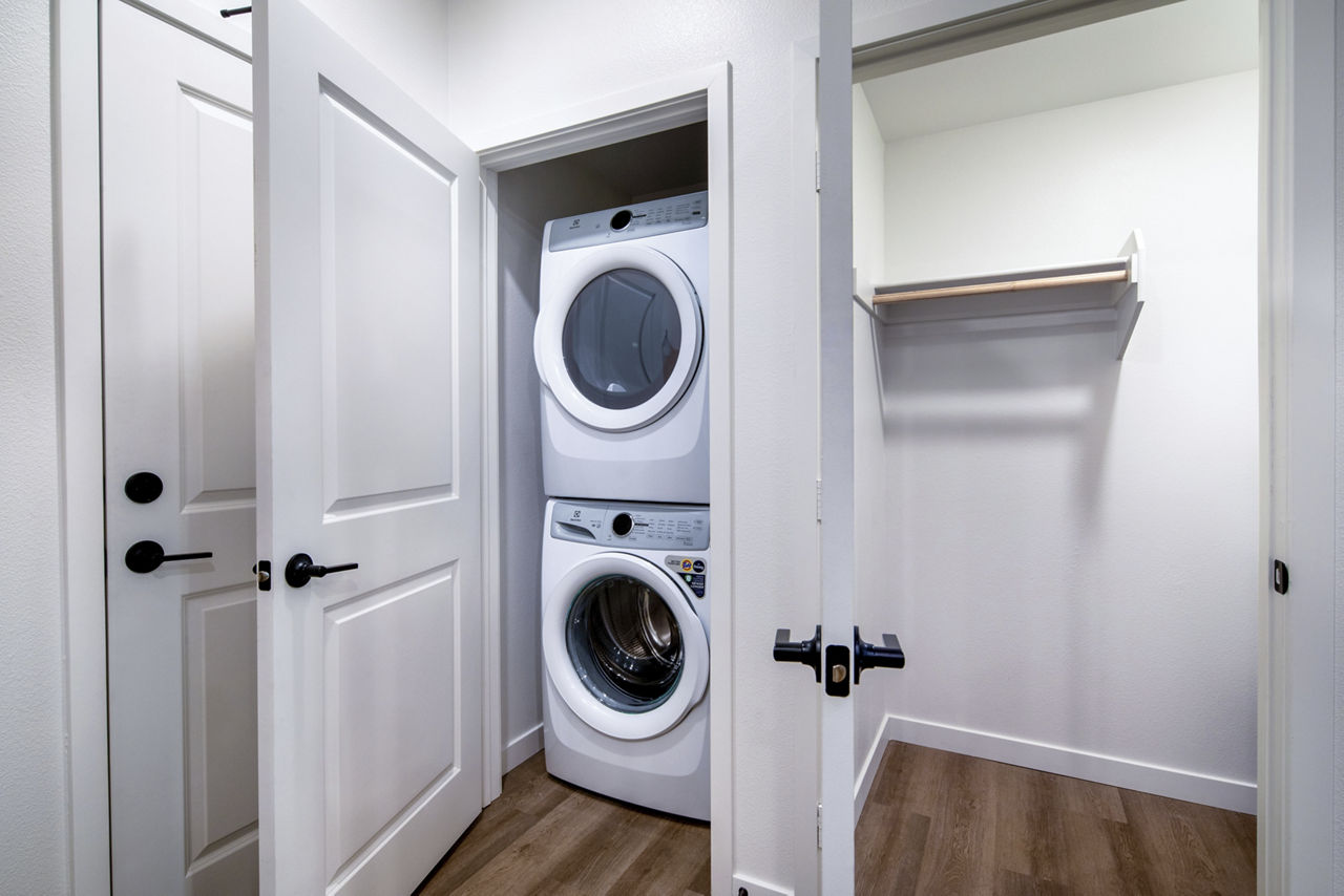 Laundry room at Ironwood At Epoca Apartments