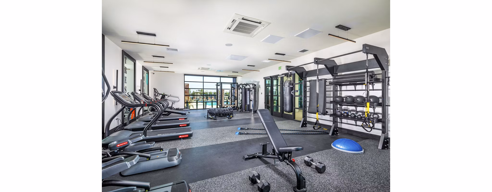 fitness center at Mason Townhomes at Epoca Apartments