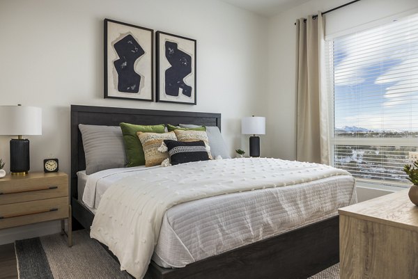 Luxury bedroom with modern decor at Braxton Apartments