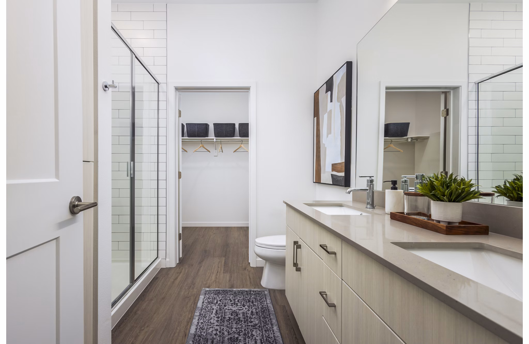 Modern bathroom featuring sleek fixtures and ample storage at Braxton Apartments, high-end living by Greystar in a vibrant community