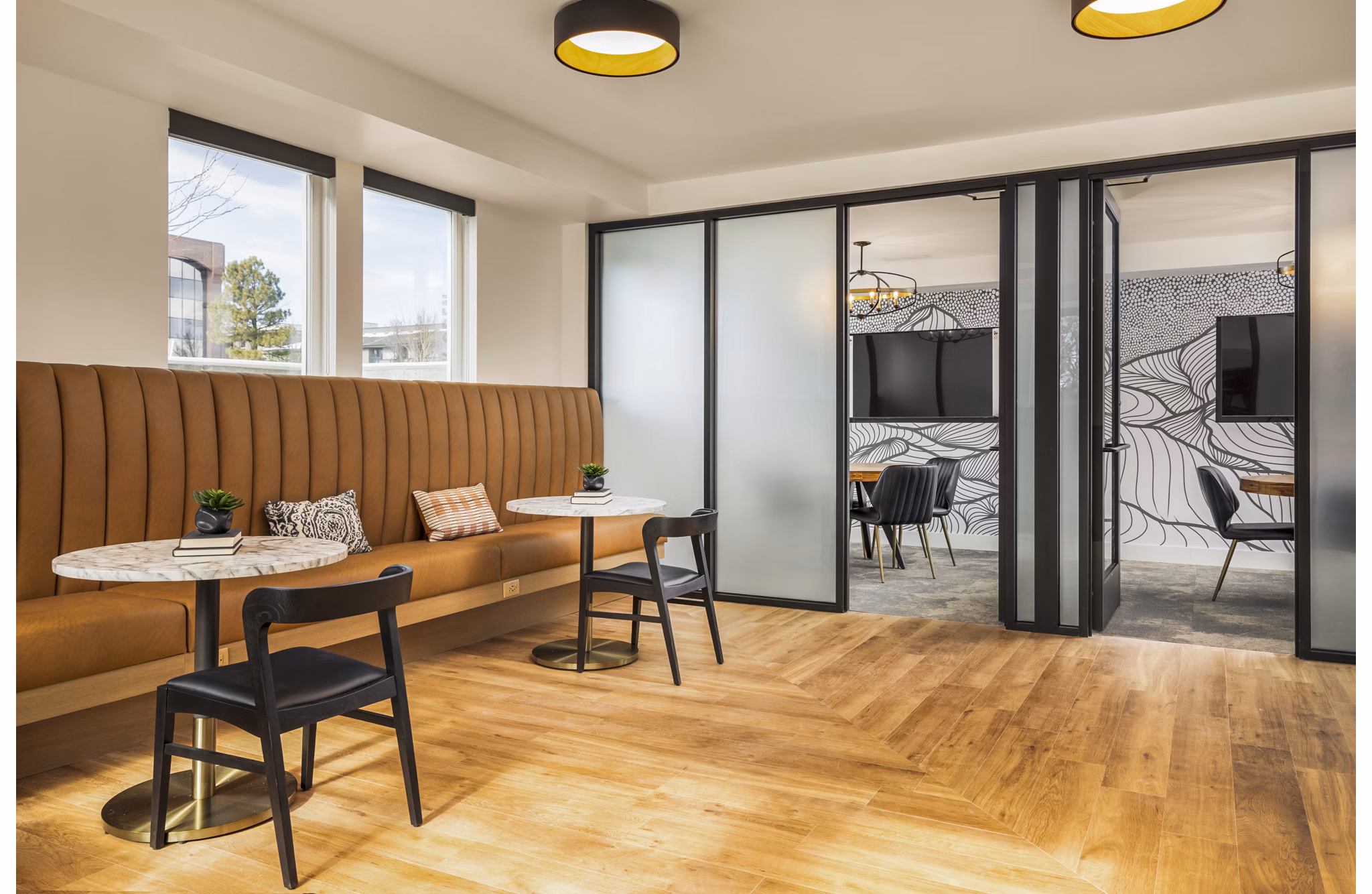Braxton Apartments: Modern clubhouse business center with collaborative workspaces in a luxury setting