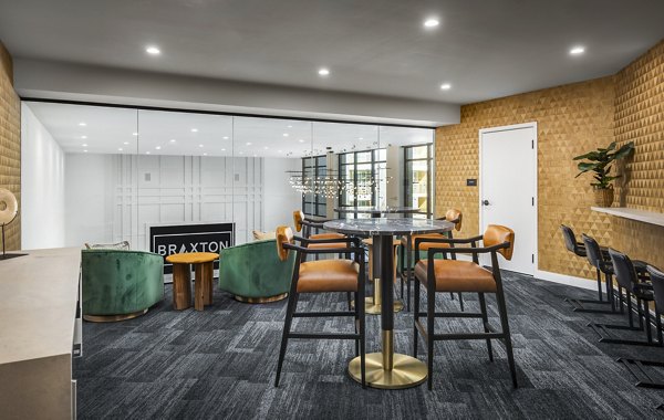 Clubhouse showcasing modern design and comfortable seating at Braxton Apartments