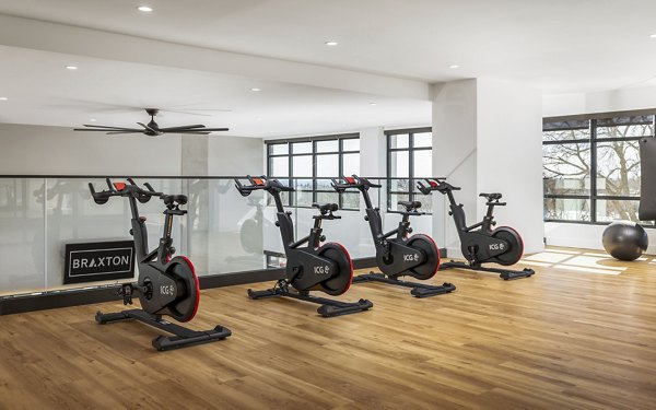 Yoga and spin studio featuring modern equipment at Braxton Apartments, a luxurious residence ideal for active lifestyles