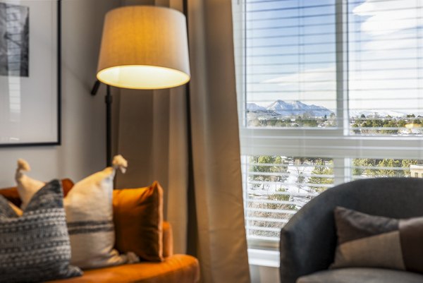 **Spacious living room with modern furnishings at Braxton Apartments, a Greystar luxury property**