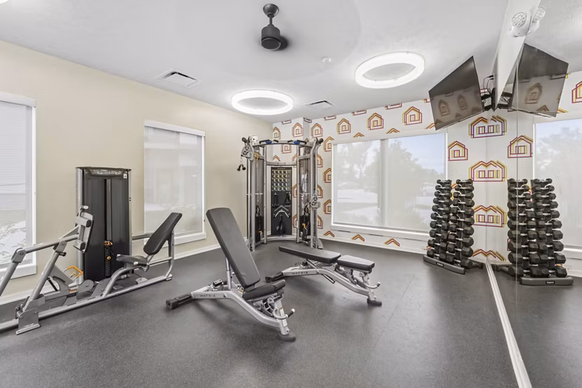fitness center at Capriana Apartments