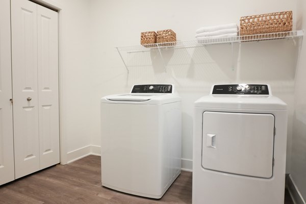 laundry room at Capriana Apartments
