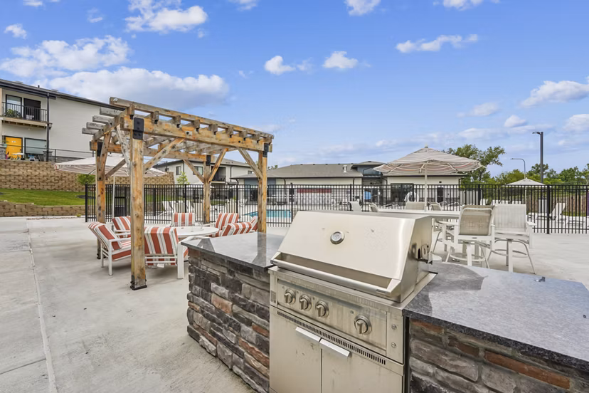fire pit/patio at Capriana Apartments