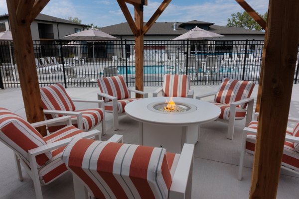 fire pit/patio at Capriana Apartments