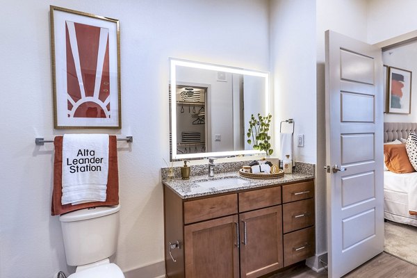 Bathroom with sleek fixtures and modern design at The Chloe Leander Apartments