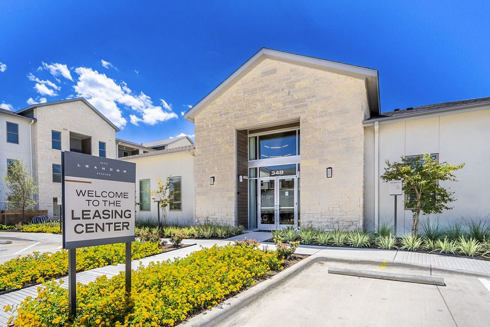 Clubhouse featuring modern decor and comfortable seating at The Chloe Leander Apartments, luxury living by Greystar