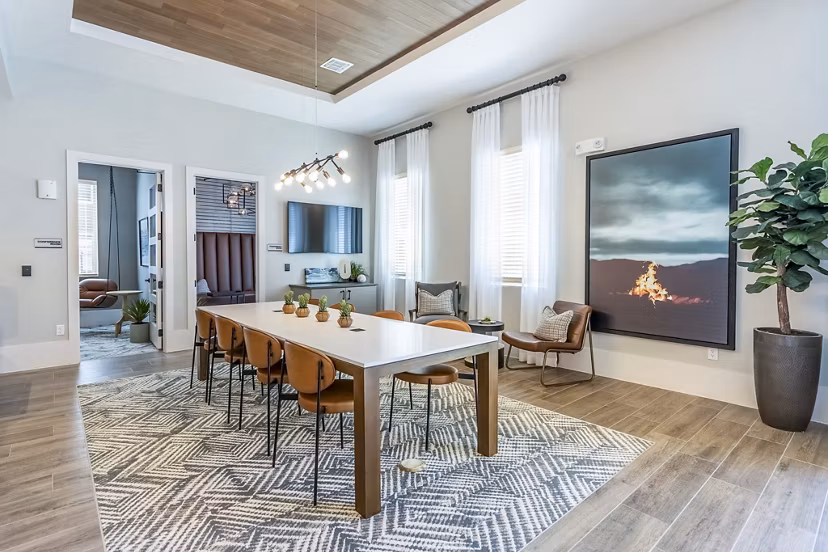 Clubhouse with contemporary design and lounging areas at The Chloe Leander Apartments