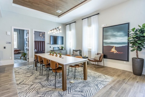 Clubhouse with contemporary design and lounging areas at The Chloe Leander Apartments