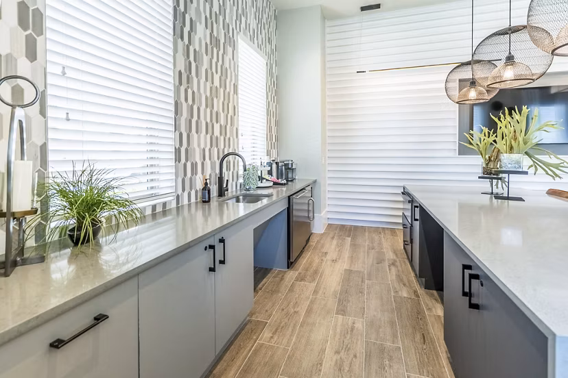 Modern clubhouse with stylish seating and ample natural light at The Chloe Leander Apartments