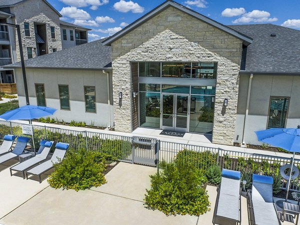 Clubhouse featuring modern design and spacious seating at The Chloe Leander Apartments, perfect for luxury living and social gatherings