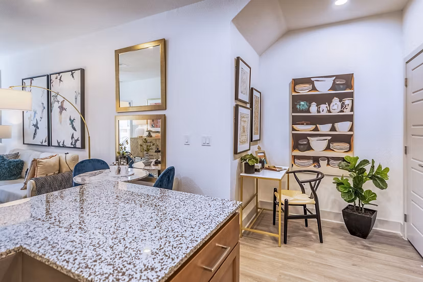 Dining room and home office with sleek decor at The Chloe Leander Apartments