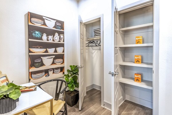 Kitchen closet with modern storage solutions at The Chloe Leander Apartments