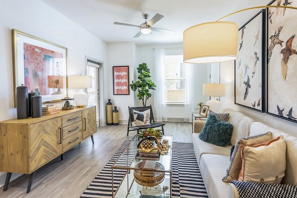 Cozy living room with modern decor at The Chloe Leander Apartments