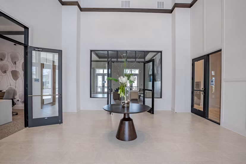 Eden Heritage Lakes Apartments: Elegant clubhouse with modern decor and comfortable seating areas