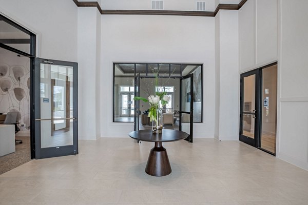 Eden Heritage Lakes Apartments: Elegant clubhouse with modern decor and comfortable seating areas