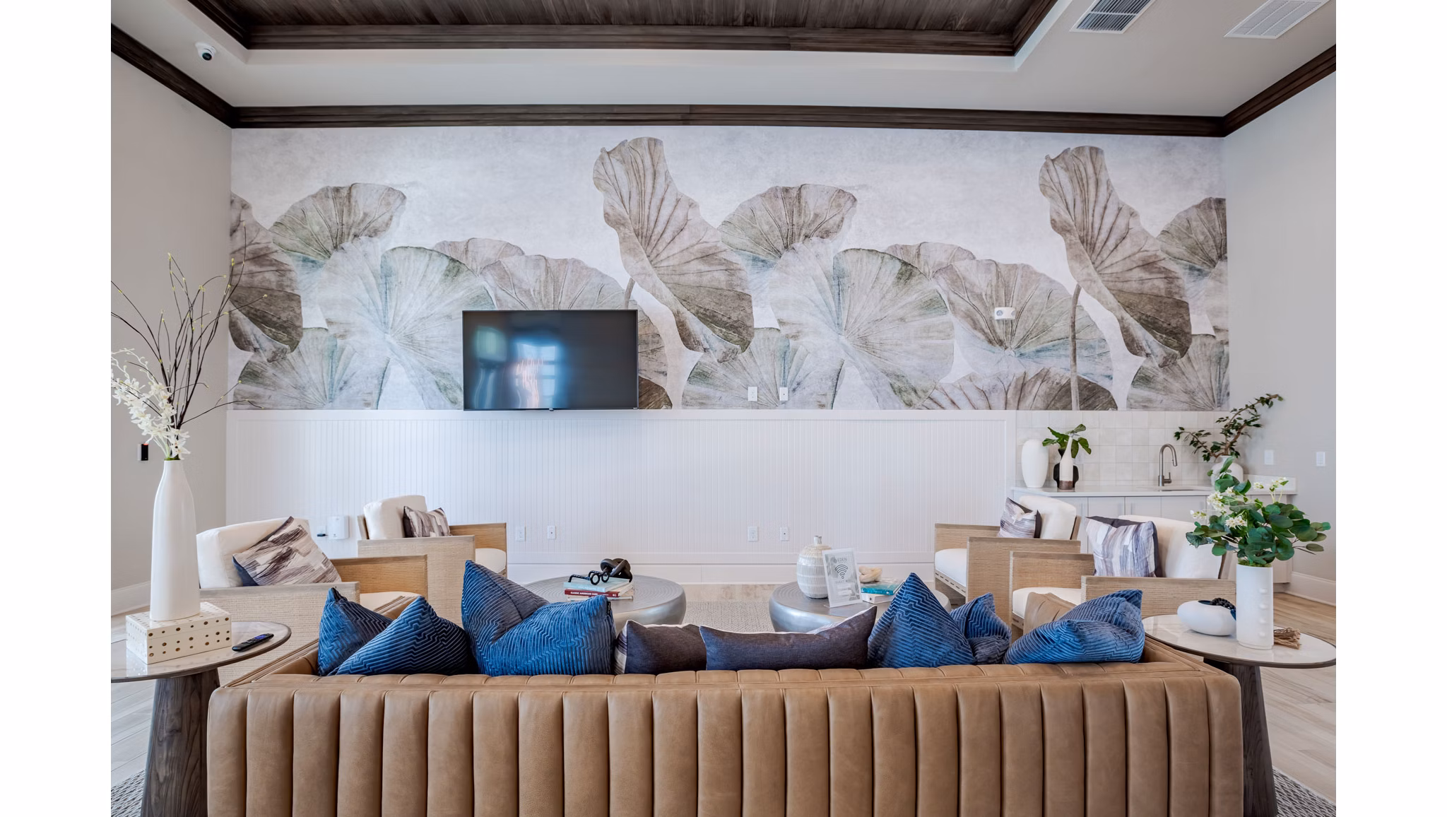 Clubhouse with elegant design and cozy seating at Eden Heritage Lakes Apartments
