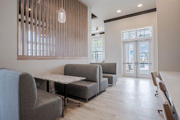 Eden Heritage Lakes Apartments: Modern clubhouse with stylish decor and spacious seating areas