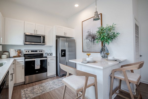 Dining area featuring elegant decor and modern furnishings at Eden Heritage Lakes Apartments