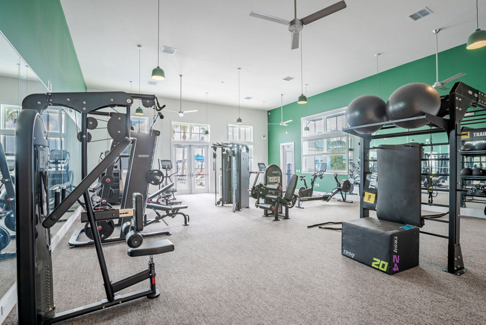 Modern fitness center with state-of-the-art equipment at Eden Heritage Lakes Apartments, perfect for active lifestyles