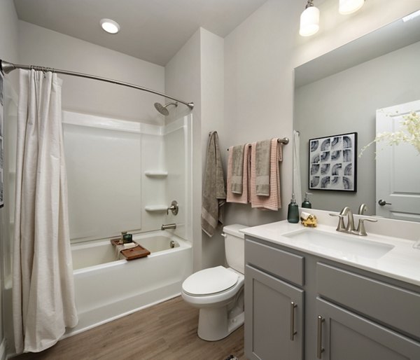 Contemporary bathroom with sleek fixtures at Generation Avondale East Apartments, offering luxury living in a stylish urban setting