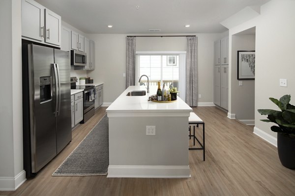 Modern kitchen with stainless steel appliances at Generation Avondale East Apartments