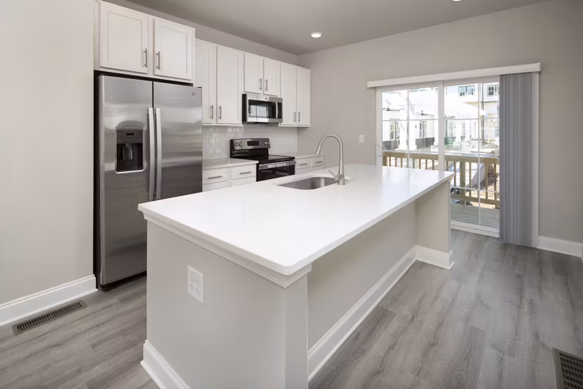 Modern kitchen with stainless steel appliances in Generation Avondale East Apartments