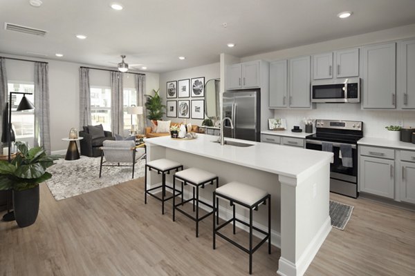 Modern kitchen with stainless steel appliances in Generation Avondale East Apartments