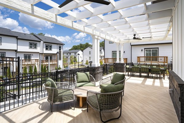 Charming outdoor patio area with seating at Generation Avondale East Apartments