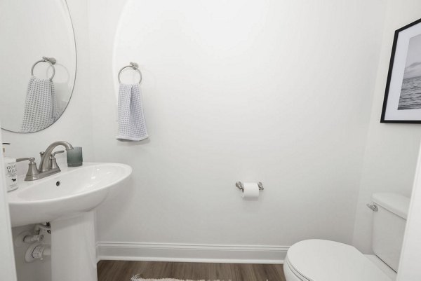 Modern bathroom with elegant fixtures at Affinity at Hudson Apartments