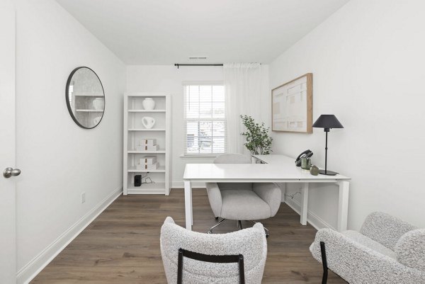 Modern kitchen with stainless steel appliances at Affinity at Hudson Apartments