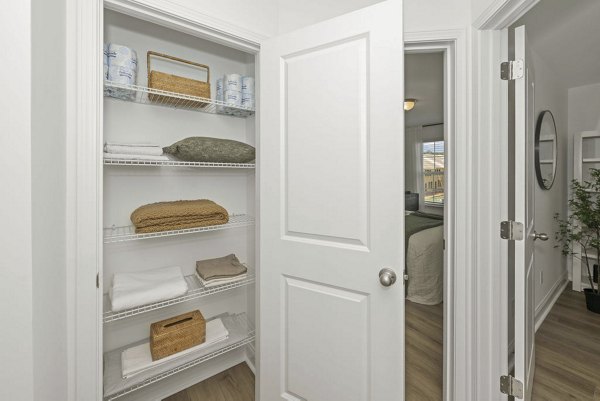 Elegant kitchen with stainless steel appliances in Affinity at Hudson Apartments