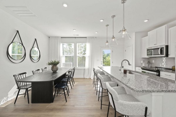 Spacious kitchen with modern stainless steel appliances at Affinity at Hudson Apartments