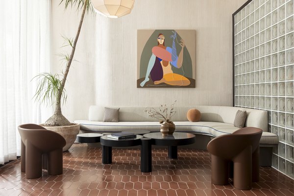 Contemporary clubhouse with stylish seating areas at The Charlie WeHo Apartments